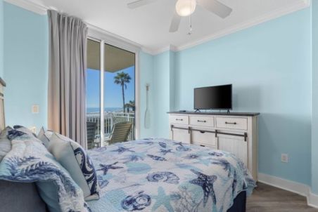 Guest bedroom with patio access